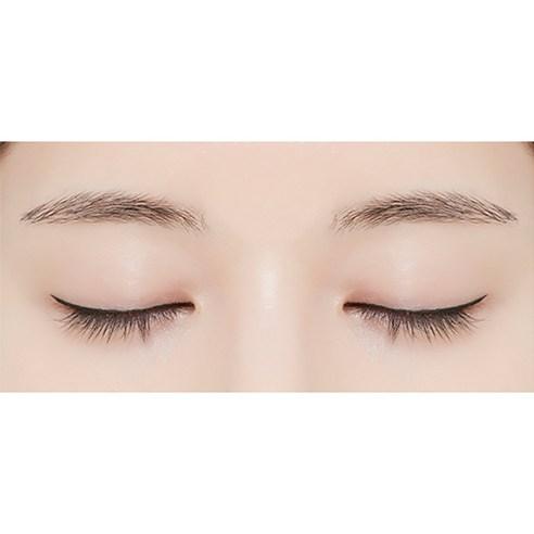 Close-up of closed eyes with precise, smooth black eyeliner application highlighting effortless definition.