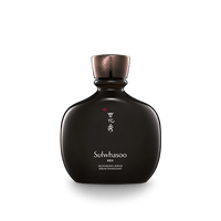 Matte dark brown rounded bottle of recharging serum with metallic bronze cap emphasizing hydration boost for men
