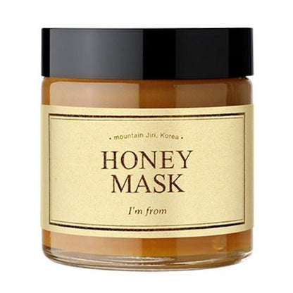 Amber jar of honey mask with cream-colored label and black lid showcasing hydration boost benefits