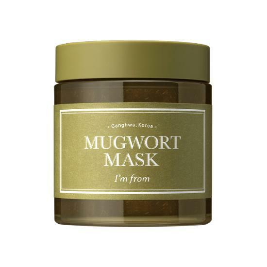 Olive green jar of soothing relief mask with minimalistic label highlighting mugwort ingredient benefits