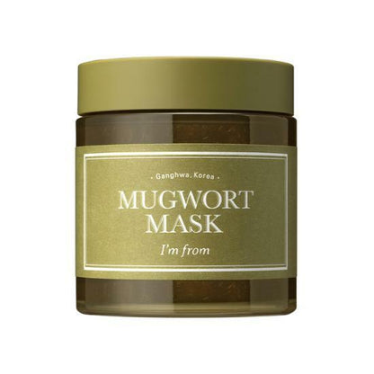 Olive green jar of soothing relief mask with minimalistic label highlighting mugwort ingredient benefits