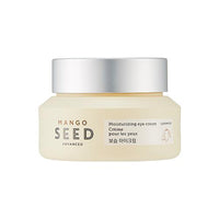 Frosted jar of mango seed moisturizing eye cream with silver lid and minimal label on white background