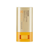 Compact gold sun stick with orange base labeled for powerful long-lasting SPF50+ PA++++ protection
