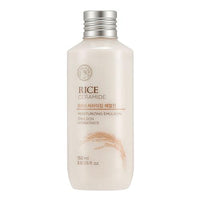 Cream-colored bottle of hydrating rice and ceramide emulsion with silver screw cap and rice illustration on label