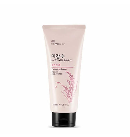 Soft pink tube of rice water bright foaming cleanser with black flip cap and rice grain illustration on front