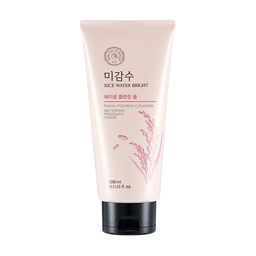 Soft pink tube of foaming face cleanser with rice illustration and black flip cap for deep cleansing ritual