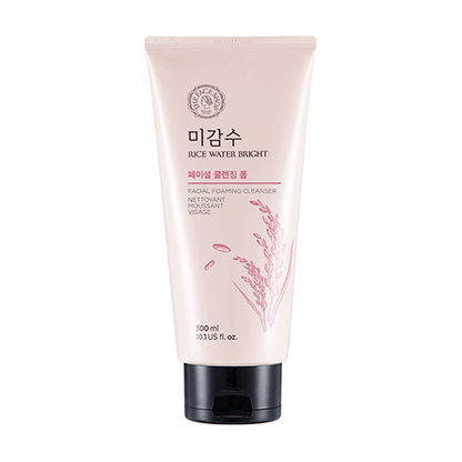 Soft pink tube of foaming face cleanser with rice illustration and black flip cap for deep cleansing ritual