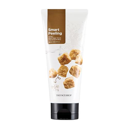 White tube of honey sugar scrub with brown sugar cubes illustration and black flip cap for blackhead removal benefits