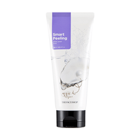 Tube of exfoliating peeling gel with pearl image and purple label on white background with black flip cap