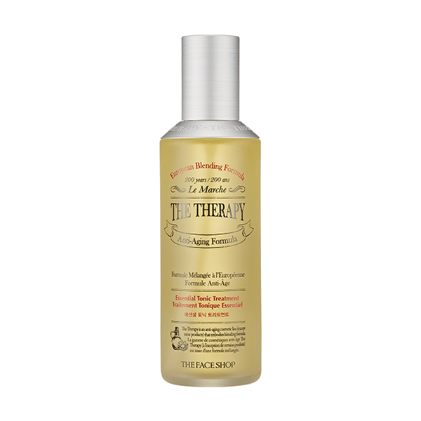 Yellow translucent bottle of hydrating tonic treatment with silver cap and vintage-inspired label design