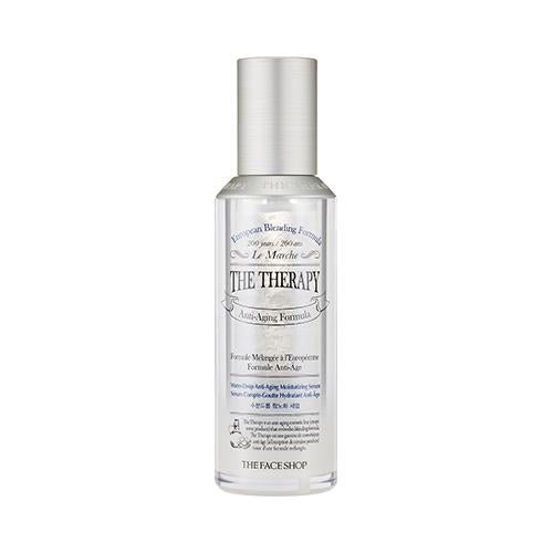 Clear bottle of anti-aging moisturizing serum with silver cap and minimalist label on white background