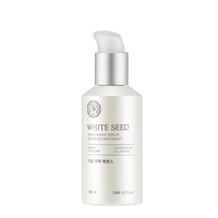 White seed brightening essence bottle with silver pump top showcasing brightening and hydration benefits on white background