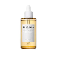 Clear amber serum bottle with white dropper cap labeled for skin repair ampoule on white background