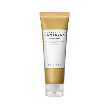 Tube of SKIN1004 Madagascar Centella Ampoule Foam in gold with white label, designed for soothing relief on white background