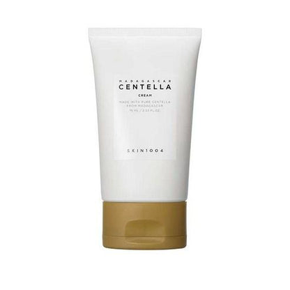 White skincare tube with beige flip-top cap labeled Madagascar Centella Cream for soothing relief on white background