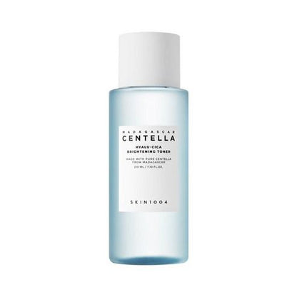 Light blue bottle of hydrating and brightening toner with white cap and minimalist label on white background