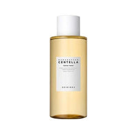 Clear amber bottle of Madagascar Centella toning toner with white cap and minimalist label on white background