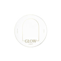 White compact cushion case with gold minimalist arch design and "GLOW LIGHT" text on top surface