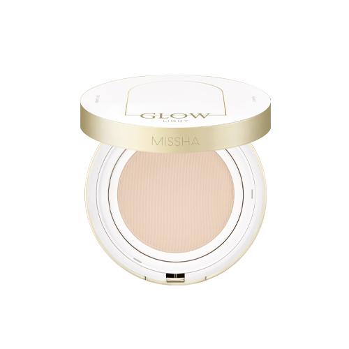 Open compact cushion foundation in light shade with UV protection in sleek white and gold case