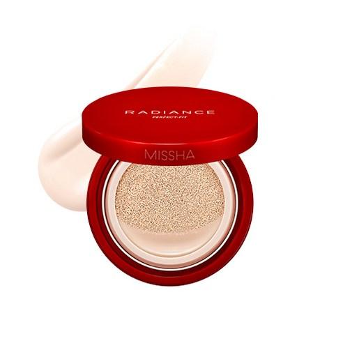 Open red cushion foundation compact with beige radiant formula and smooth texture on white background