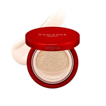 Open red cushion compact with beige long-lasting foundation visible inside on white background