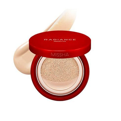 Red compact cushion foundation with beige radiance-perfecting formula swatch behind on white background