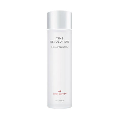Tall frosted white bottle with silver cap containing anti-aging skin essence on a plain white background