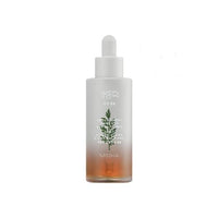 Frosted glass dropper bottle with calming artemisia design and amber liquid for redness reduction on white background