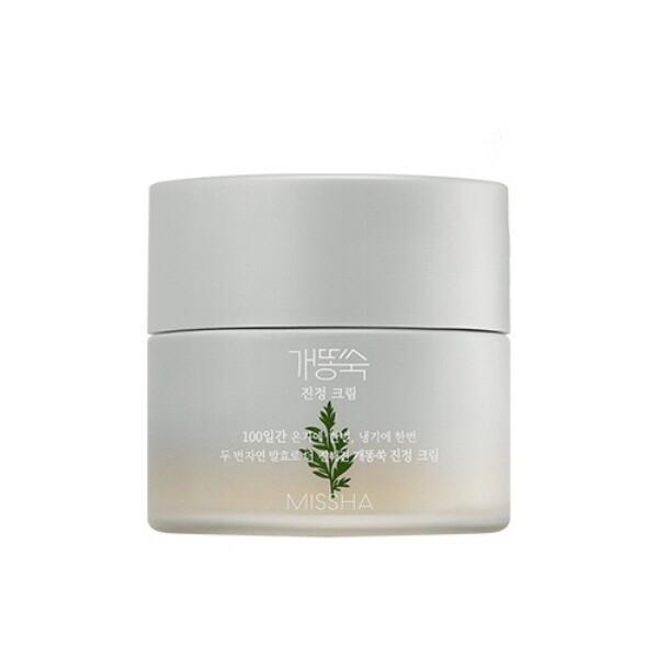 Minimalist frosted jar of calming moisture cream with green artemisia leaf design and subtle Korean text on white background