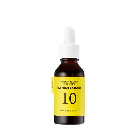 Amber dropper bottle with bright yellow label for brightening skin blemish care serum on white background