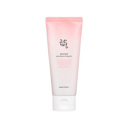 Pink and white gradient tube of gentle exfoliating apricot blossom peeling gel with black and red text on white cap