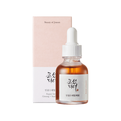 Amber glass dropper bottle with white label and pale pink box for hydrating ginseng and snail mucin serum