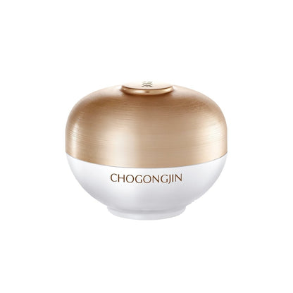 White and gold jar of dark spot correcting cream with smooth rounded design on white background