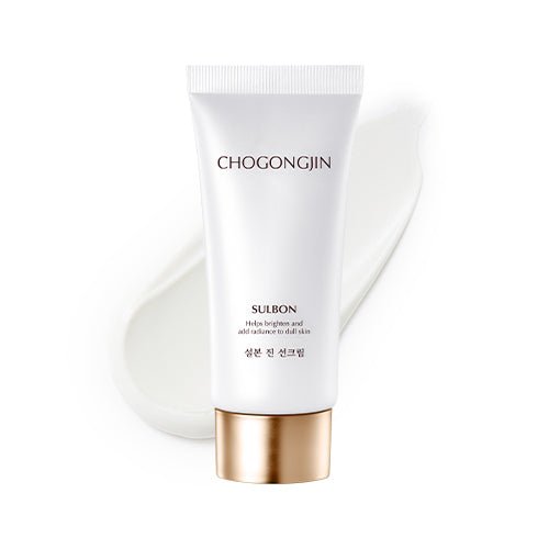 White tube of high protection sunscreen with gold cap and smooth cream swatch on white background