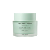Matte mint green jar of pore cream with smooth cap featuring soothing formula text on white background