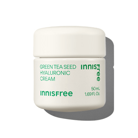 Minimalist white jar of hydrating green tea seed cream with hyaluronic acid text in green lettering