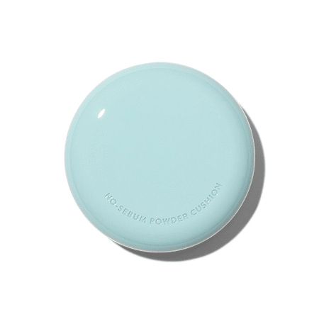 Light blue compact cushion case with smooth matte finish and subtle embossed product name on top surface