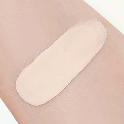 Light beige powder cushion swatch on skin highlighting smooth texture and long-lasting coverage effect