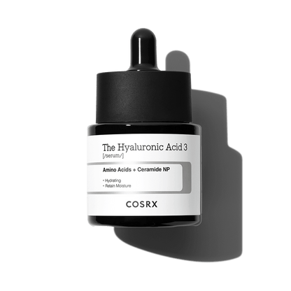 Small dark dropper bottle of hydrating serum with amino acids and ceramide on white background and shadow