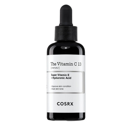 Dropper bottle of vitamin C serum featuring super vitamin E and hyaluronic acid for improved skin tone and condition