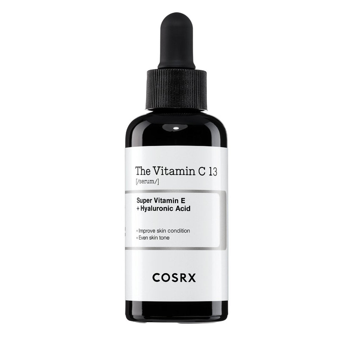 Dark glass dropper bottle of vitamin C serum with label highlighting vitamin E and hyaluronic acid benefits
