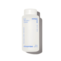 Minimalist white bottle of Bija Trouble Toner with blue text highlighting sebum control and skin refresh benefits
