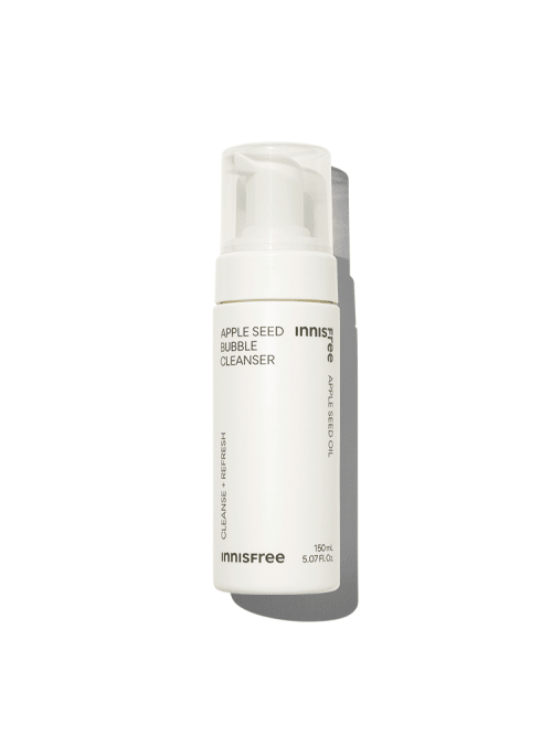 White foam pump bottle of gentle apple seed bubble cleanser with minimalist black text on white background