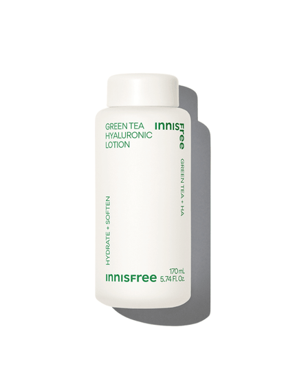 Minimalist white bottle of green tea hyaluronic lotion emphasizing hydration and softening benefits with clean green text