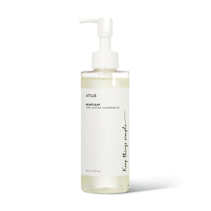 Clear pump bottle labeled mild pore control cleansing oil on plain white background
