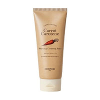 Beige tube of balancing cleansing foam featuring carrot illustration and minimal text on plain white background