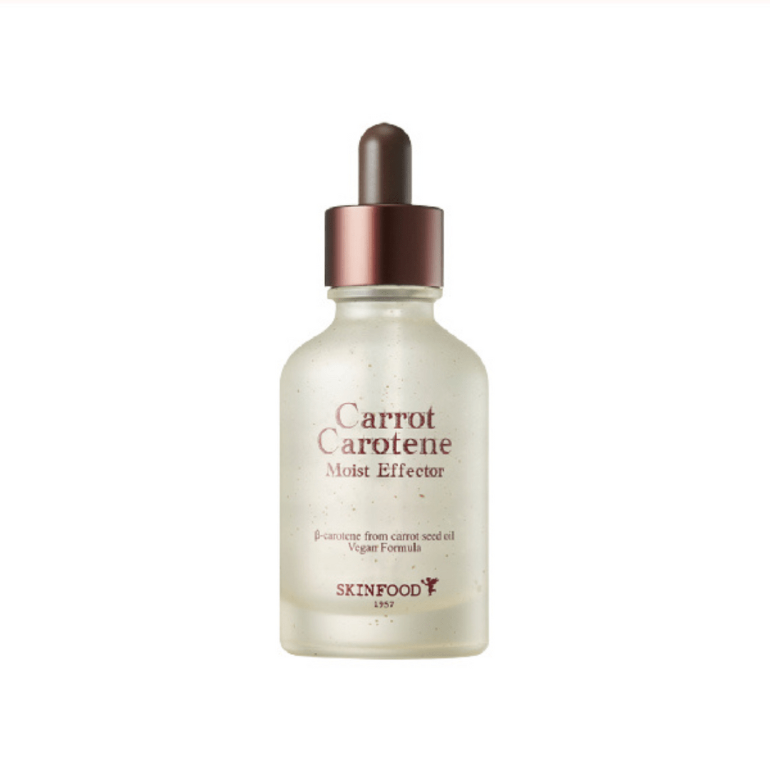Frosted glass dropper bottle with moisturizing carrot carotene serum for intense hydration and vegan formula
