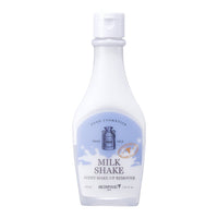 White bottle of gentle milk shake point make-up remover with blue label and milk jug illustration on front