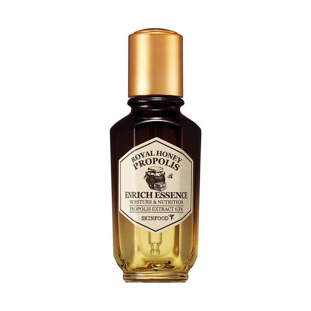 Dark amber and gold gradient bottle of nourishing essence featuring propolis extract for deep hydration benefits