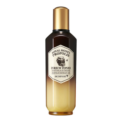 Toner bottle with gradient amber design and gold cap labeled for intense hydration and nourishment with propolis extract